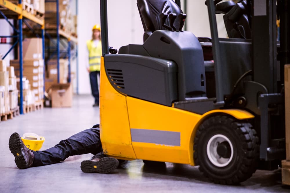 A worker injured in a warehouse accident.