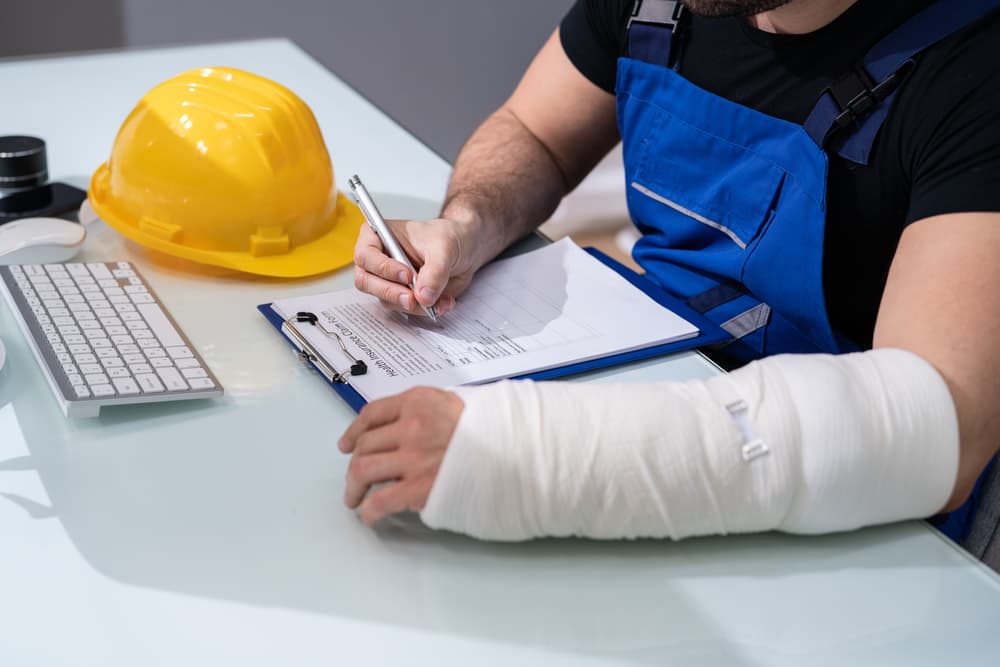 A man submitting a workers' compensation claim.